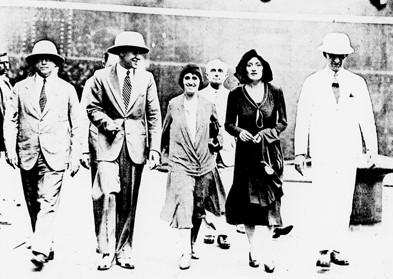 Rodolfo Nolli was part of the welcoming committee that received Edda and Galeazzo Ciano, the daughter and son-in-law of Benito Mussolini, during their visit to Singapore in October 1930. From left: V. Pini, the Italian Consul in Singapore; Galeazzo Ciano; Mrs Pini; Rodolfo Nolli; Edda Ciano; and G. Aurely. Image reproduced from the Straits Budget, 9 October 1930, 17. (From NewspaperSG).